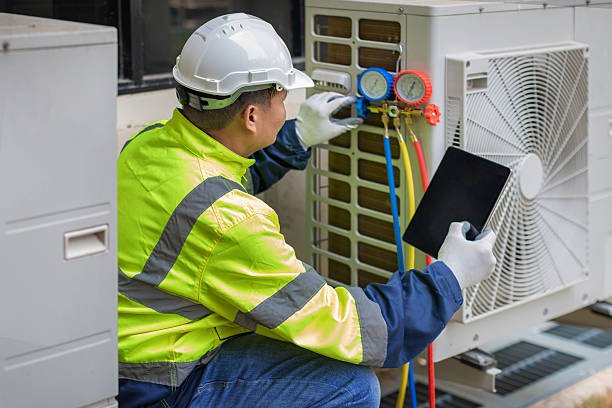 Professional Hvac technician working in Yaphank, NY